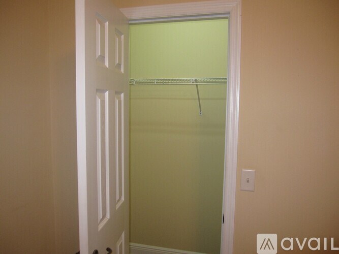 A white door with a glass window in the middle.