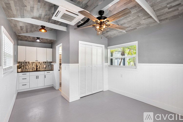 A front-loading washing machine with a transparent door.