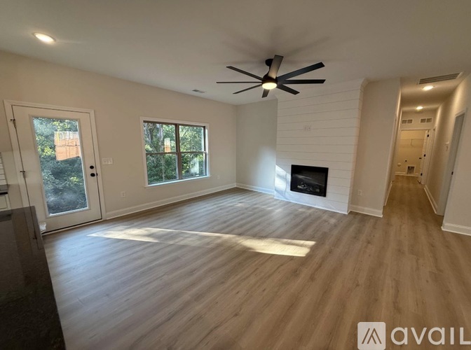 A floor plan of a house with a kitchen, living room, and bedrooms.
