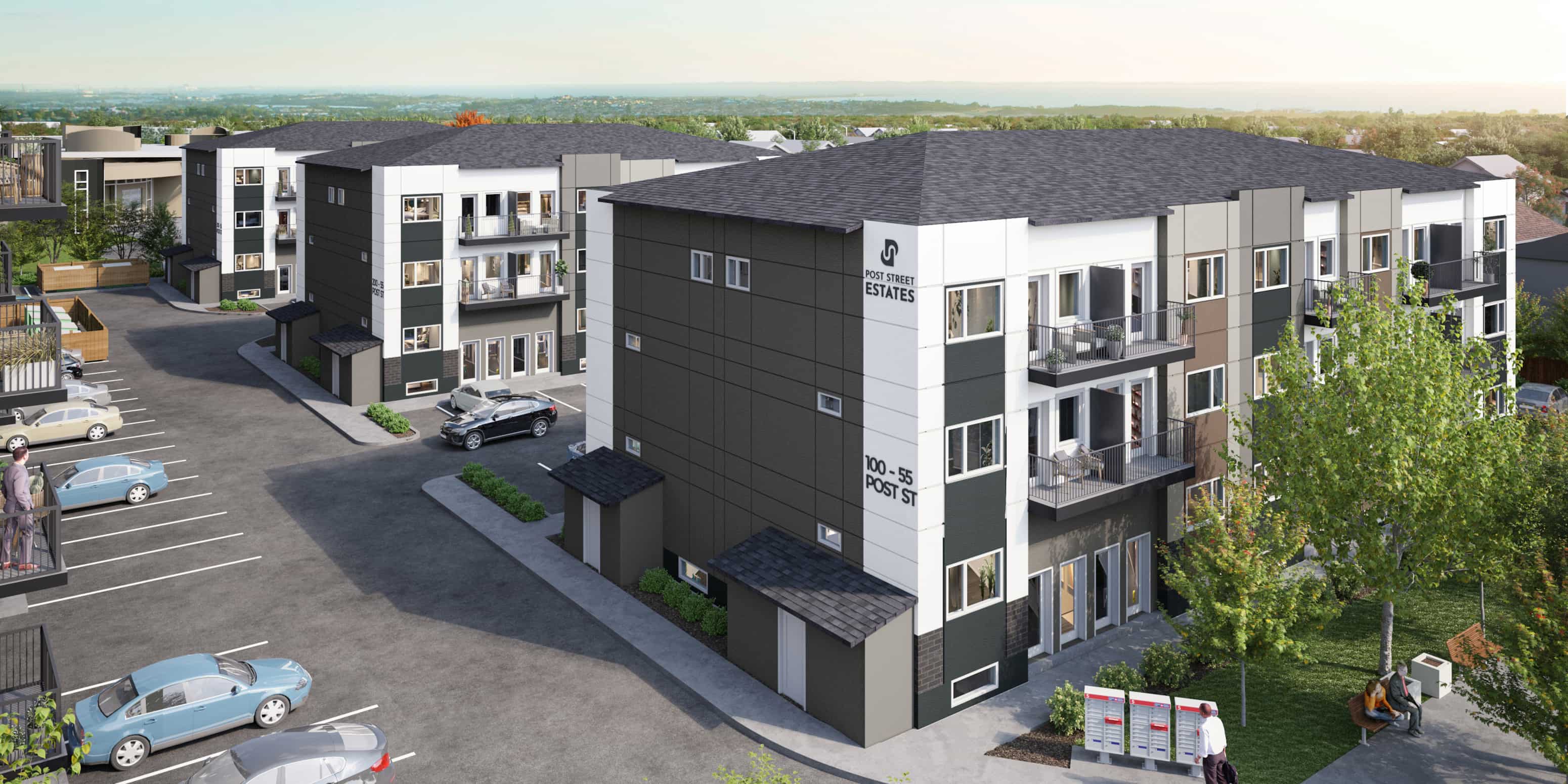 A modern apartment complex with a parking lot in front.