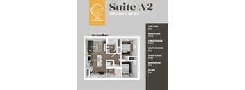 A floor plan for a 2-bedroom, 2-bath suite with a living room, dining/kitchen area, and bathrooms.