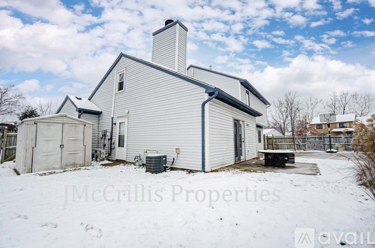 A house with a chimney is for sale by JMccrillis Properties.