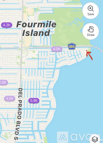 A map shows a section of Fourmile Island and Del Prado Blvd.