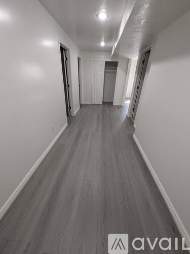 A long hallway with a logo that says "avail" on the bottom right.
