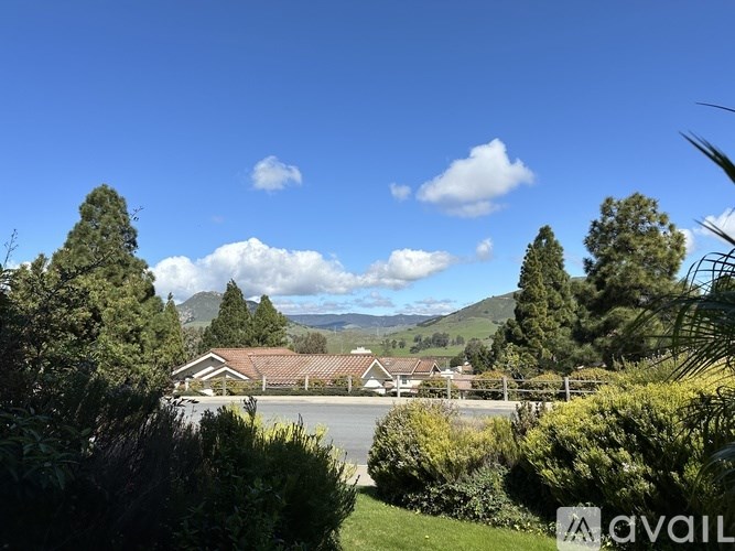 A suburban neighborhood with houses and trees.