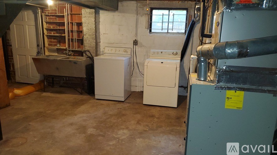 A laundry room with a washer and dryer.