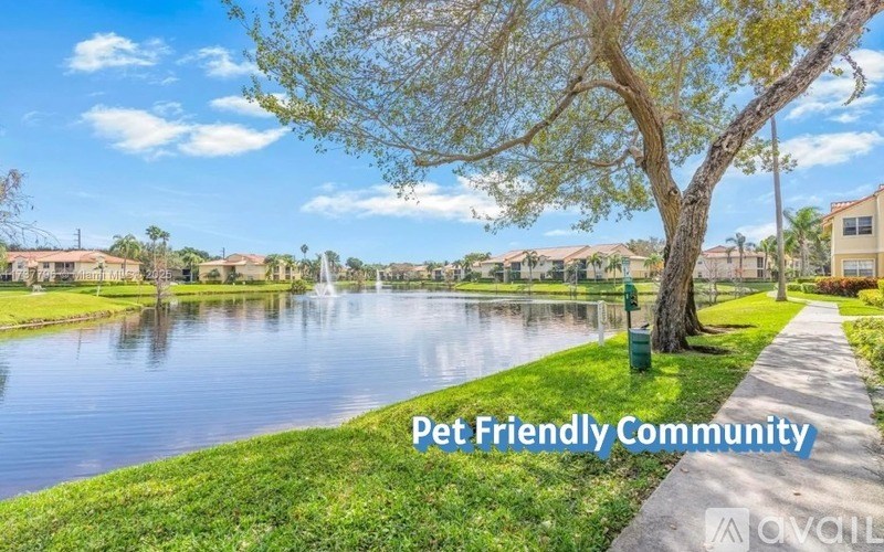 A pet-friendly community with a lake and a walking path.