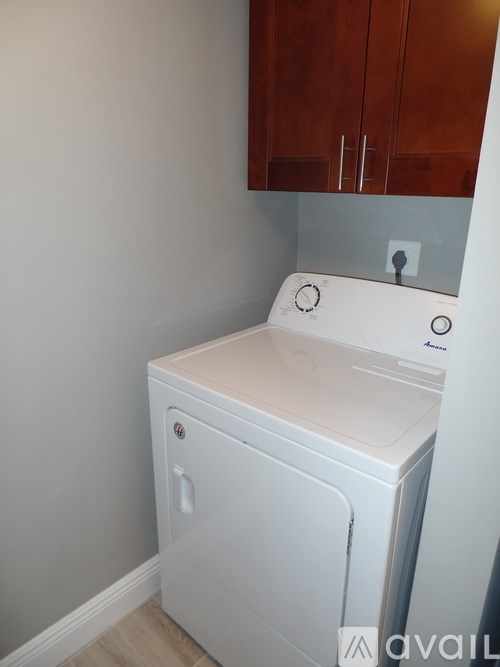 A white dishwasher is available for rent.