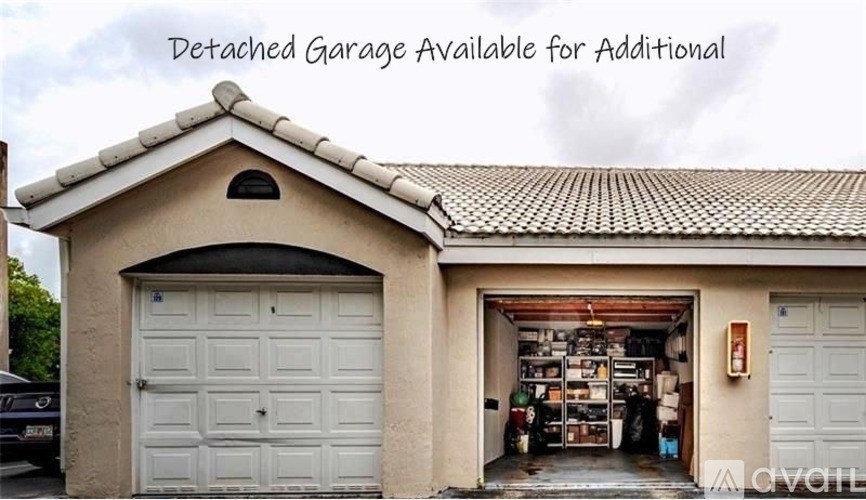 A detached garage is available for additional storage.