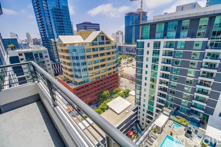 A view of a cityscape with a mix of modern and older buildings.