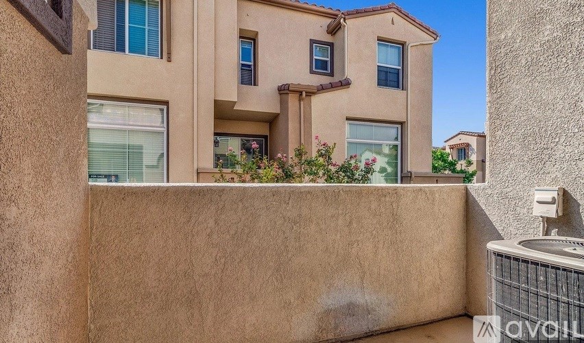 A wall with a sticker that says "AVAILABLE" on it.