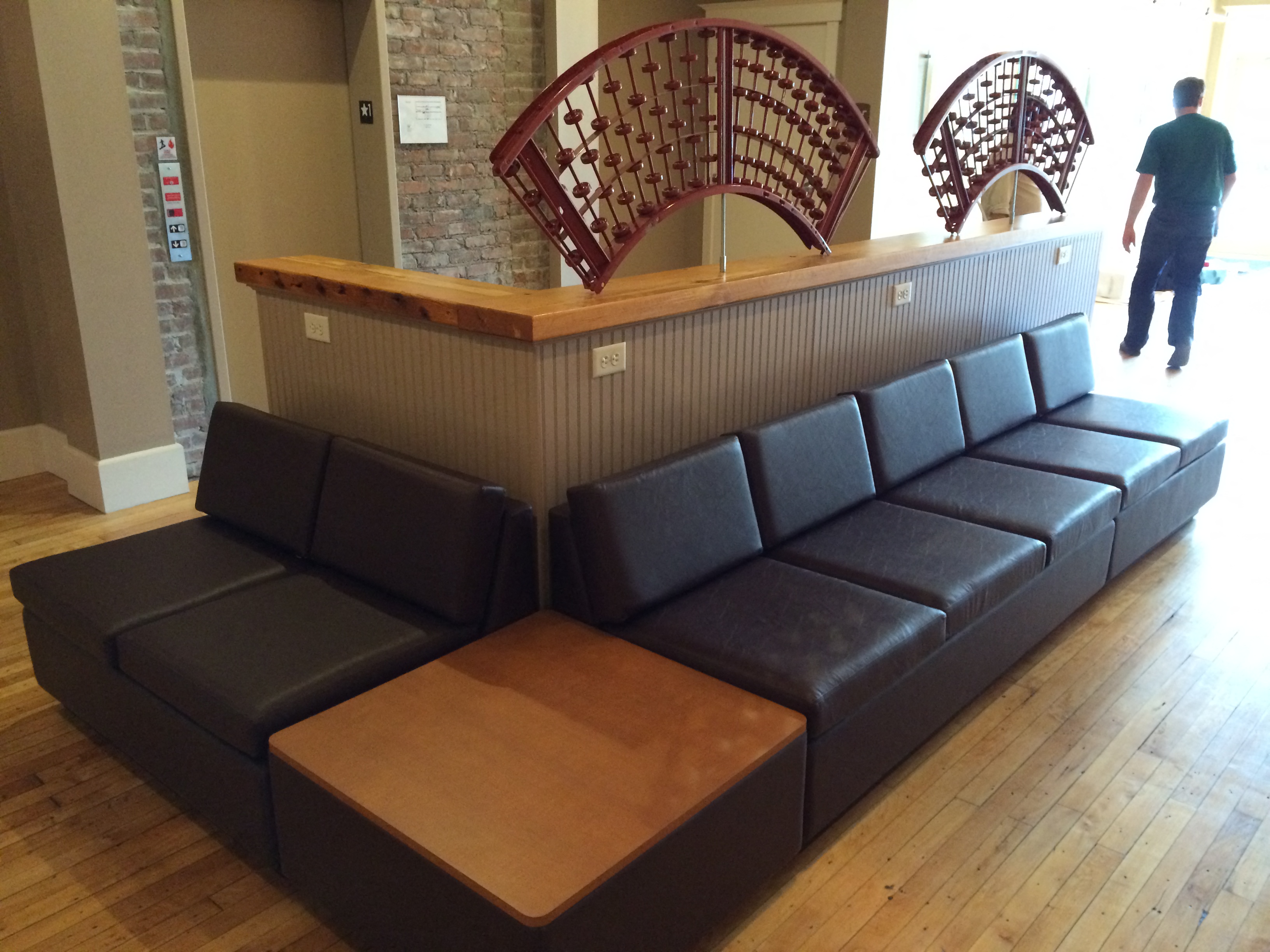 a seating area with a couch and a coffee table