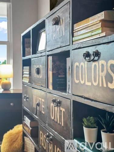 A set of drawers with labels for "Colors", "Write On", and "Colors" are stacked on top of each other.