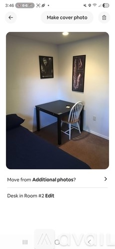 A room with a desk and a chair.