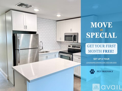 A kitchen with a refrigerator, microwave, and oven is on sale for the first month free.