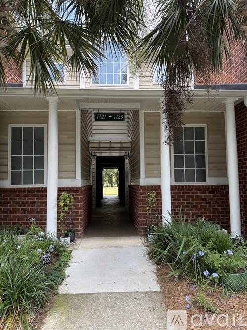 A house entrance with a sign that says "available".
