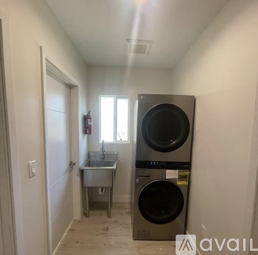 A laundry room with a washer and dryer.