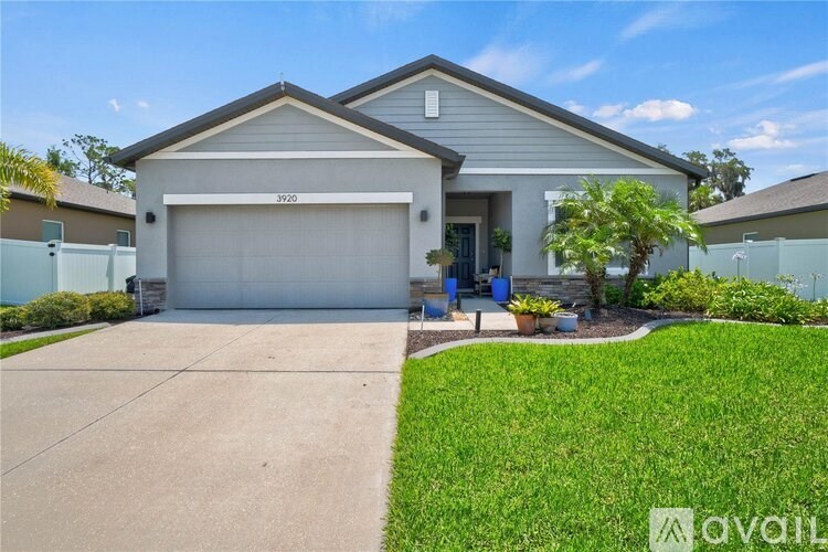 A house with the number 9220 on the garage door.
