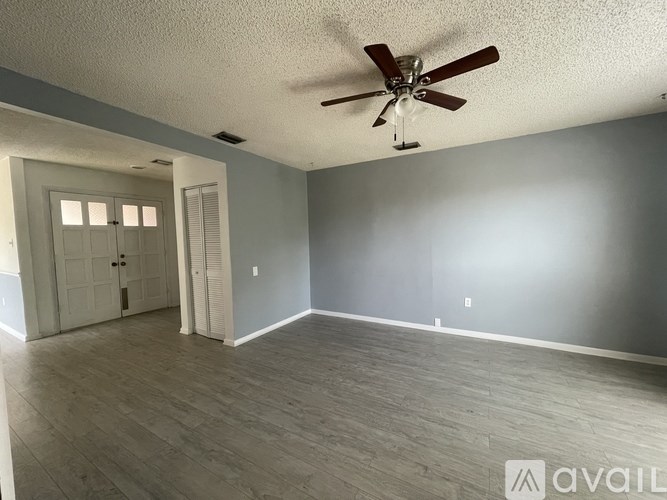 A kitchen with a sink and a dishwasher.