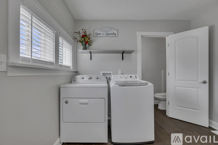 A laundry room with a washer and dryer.