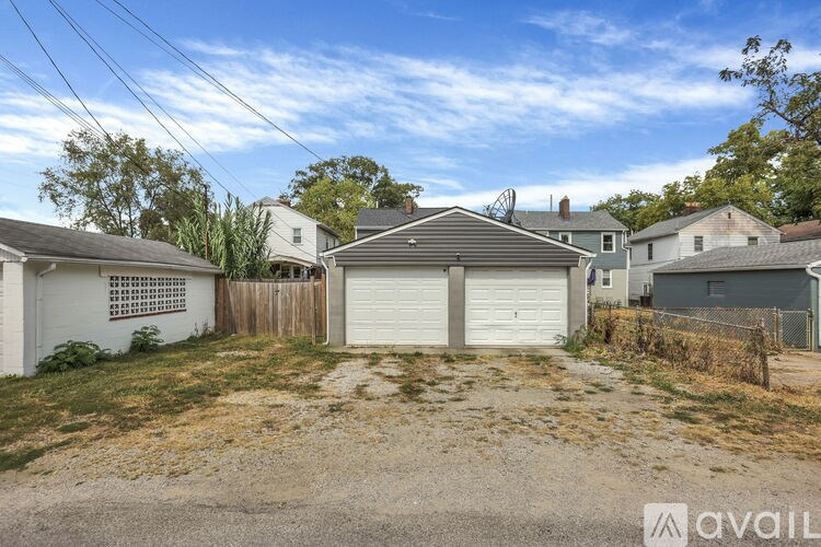 A house with a garage is available for rent.