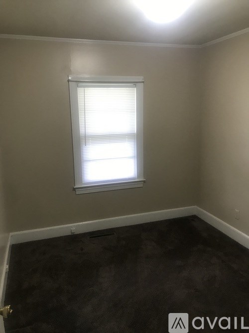 A room with a window and Avail logo.