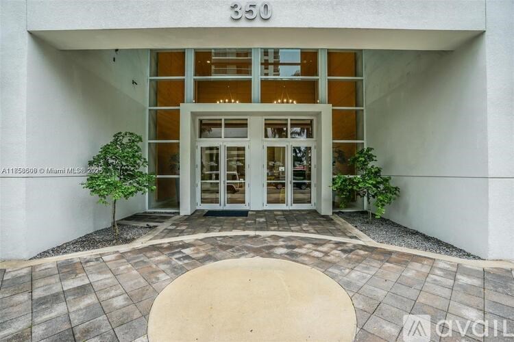 The image shows the front of a building with the number 350 on it.