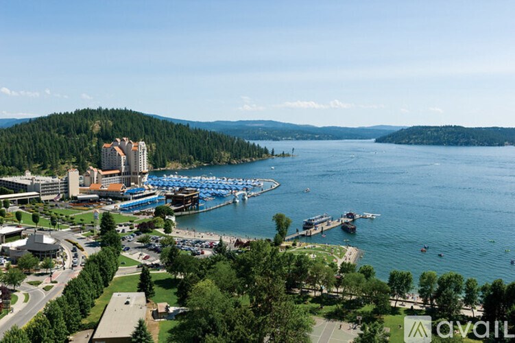 A large body of water with boats and a dock.