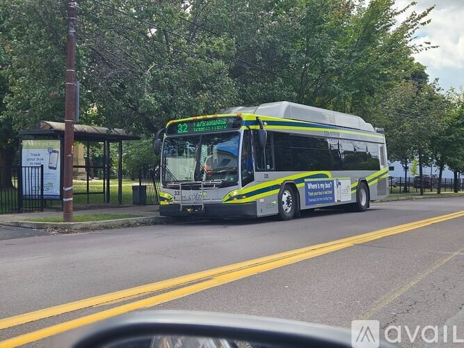 A bus with the number 22 on the front is driving down a street.