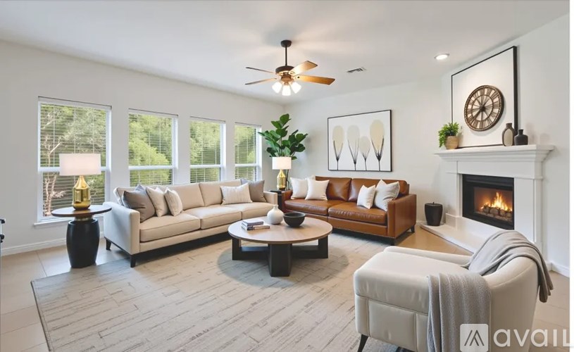 A living room with a fireplace and a couch.