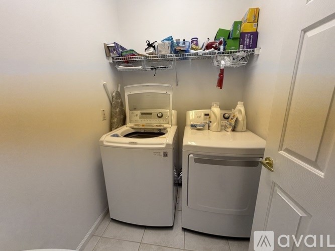A bathroom with a toilet and sink.