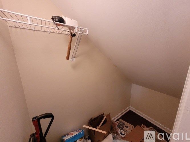 A floor plan of an apartment with a living room, kitchen, and bathroom.