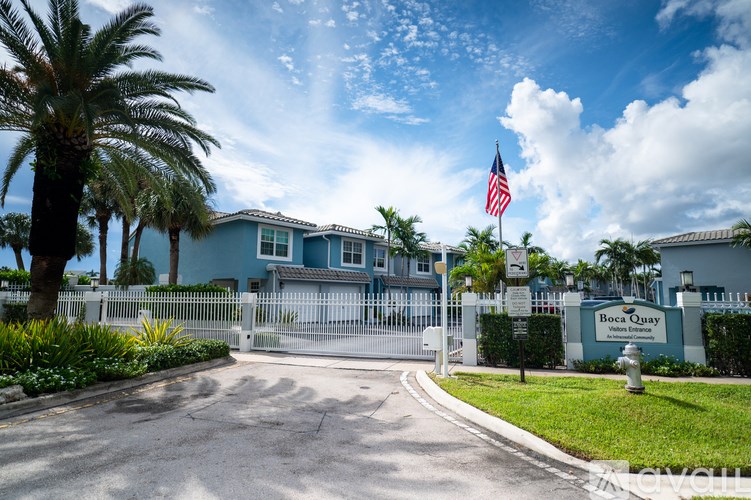 The entrance to Boca Quay with a flag flying in the background.