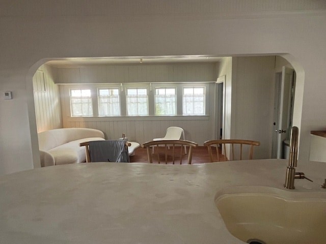 A white room with a table and chairs.