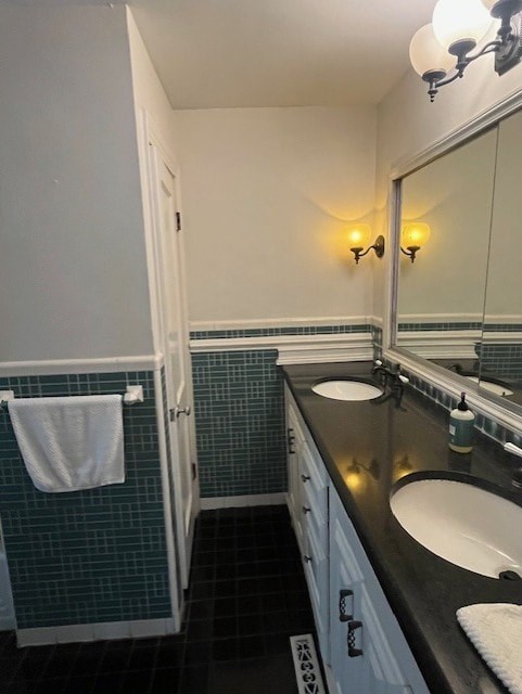 A bathroom with a white towel hanging on the wall.