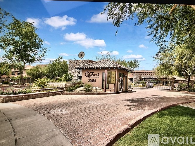 The image shows a building with a sign that reads "Las Vegas" and a phone number "202660".