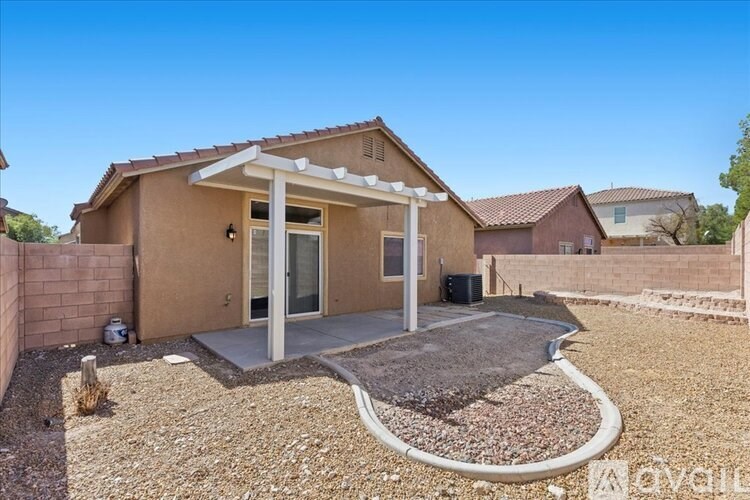 A house with a brown exterior and a white roof is for sale.