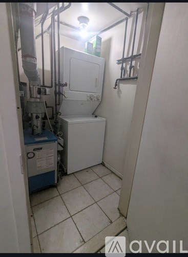 A small bathroom with a toilet and a sink.