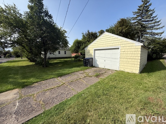 A garage is attached to a house.