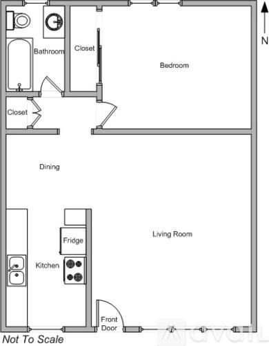A floor plan of a living space showing a kitchen, dining area, and bedroom.
