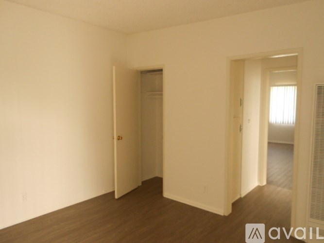 A room with a door and a window.