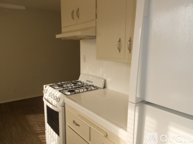 A white stove and oven in a kitchen.