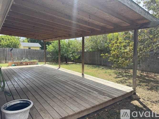A kitchen with wooden cabinets and a white countertop.