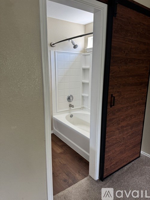 A baby room with a crib and a dresser.