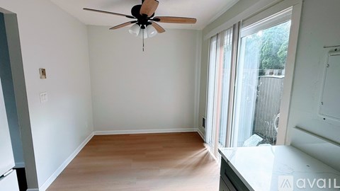 A kitchen with a sink and a window.