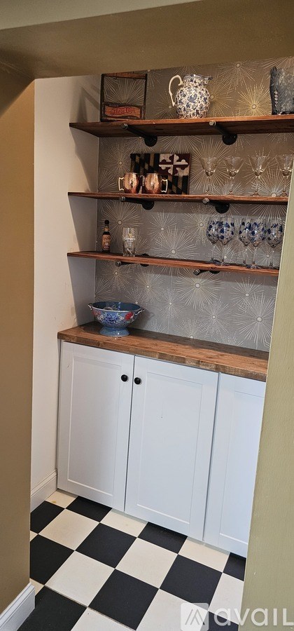 A black and white checkered floor in a room.