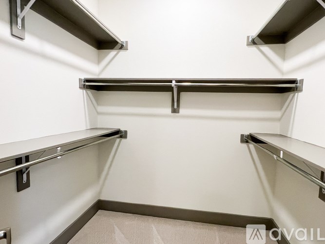 A row of metal shelves in a storage room.