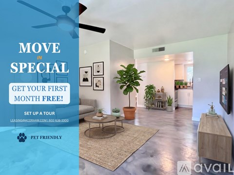 A room with a bed, couch, and chair is on display for a move in special offer.