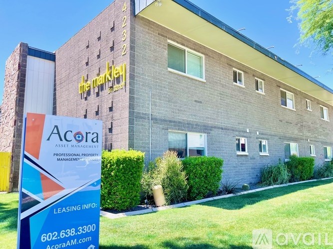 The building is called The Markley and is a professional property management company.