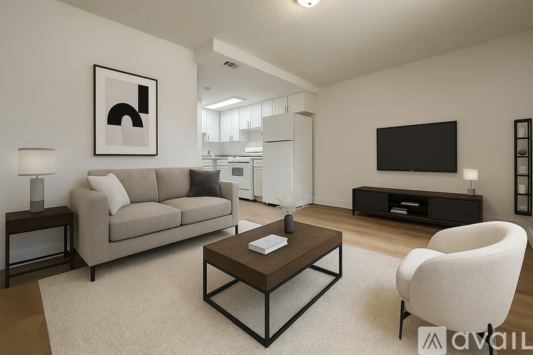 A kitchen with white appliances and cabinets.